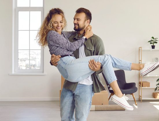 Couple in home with affordable home insurance in Alliance, OH 